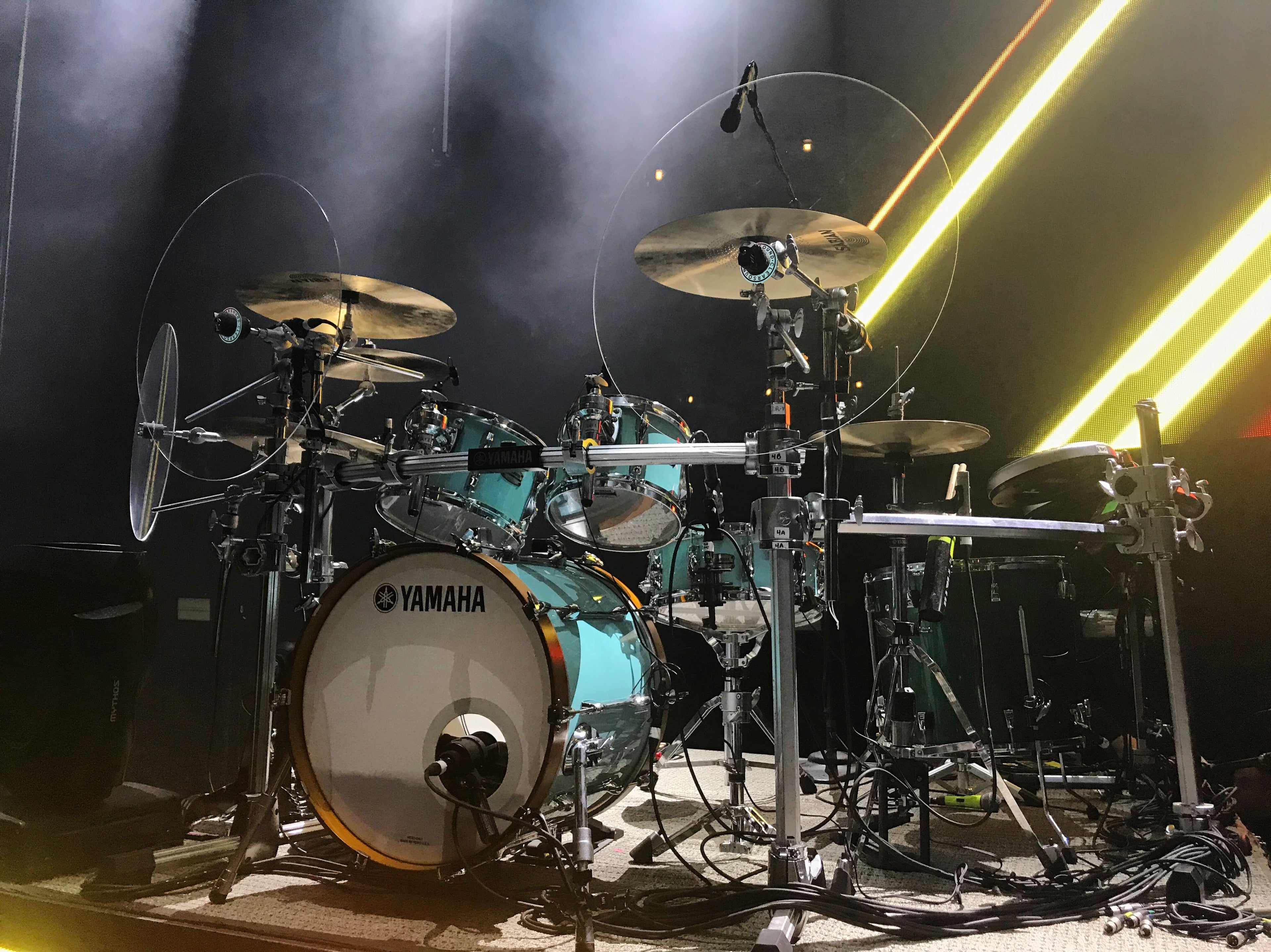 blue drum set with drum baffles and cymbal baffles